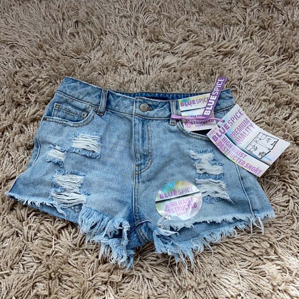 Blue spice high-wasted distressed denim shorts